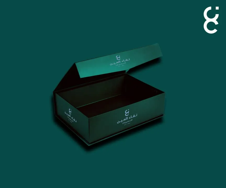 The rigid eyewear box open, showing the structured inner reveal and the mark foiled on the lid